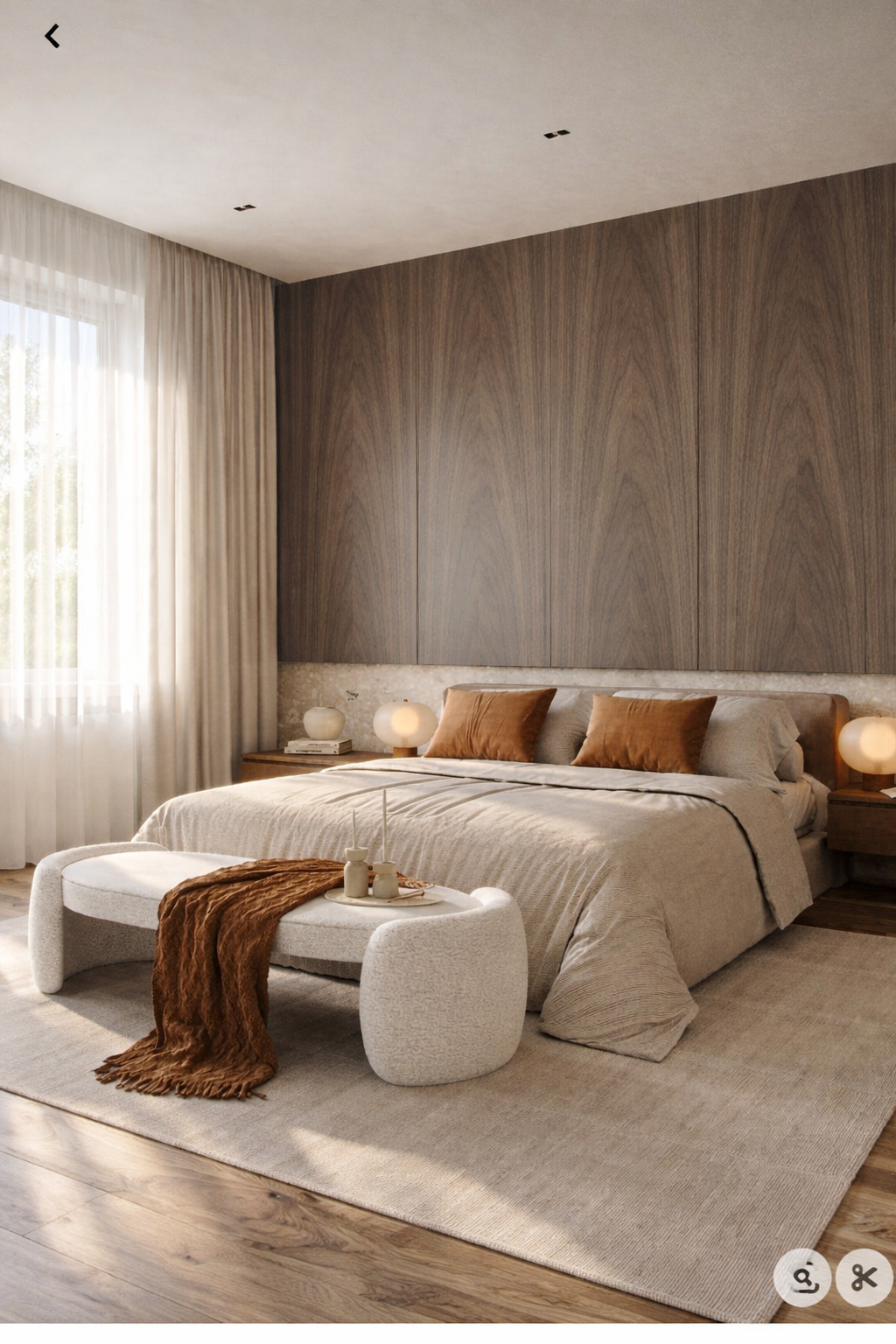 Modern bedroom with wooden wall, bed, and side tables.