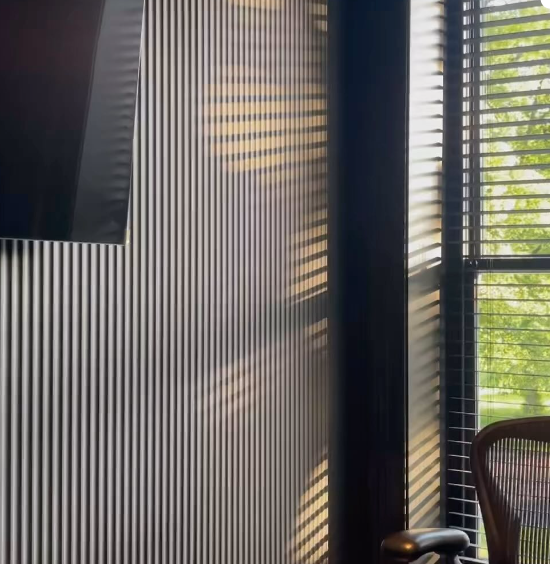 Fluted black wall panels