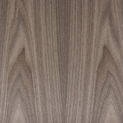 Close-up of a wood grain texture with a brown color.